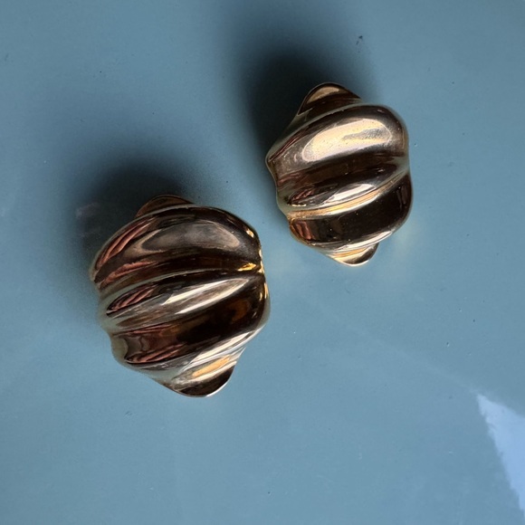 Large gold tone clip on vintage earrings